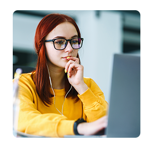 Teen on laptop.