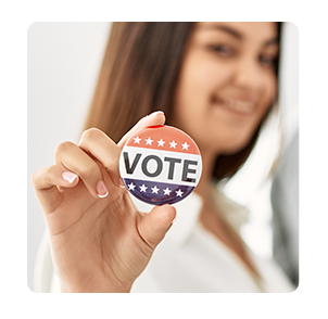 Woman with "Vote" pin